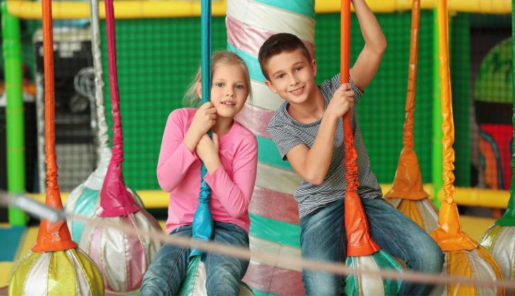 kids playing at indoor playground franchise near me